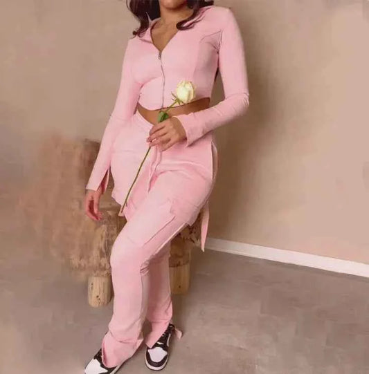 High-waist pink women's utility cargo pants with wide legs, multiple pockets, and drawstring waist from Mead's Supply & Equipment Outfitters