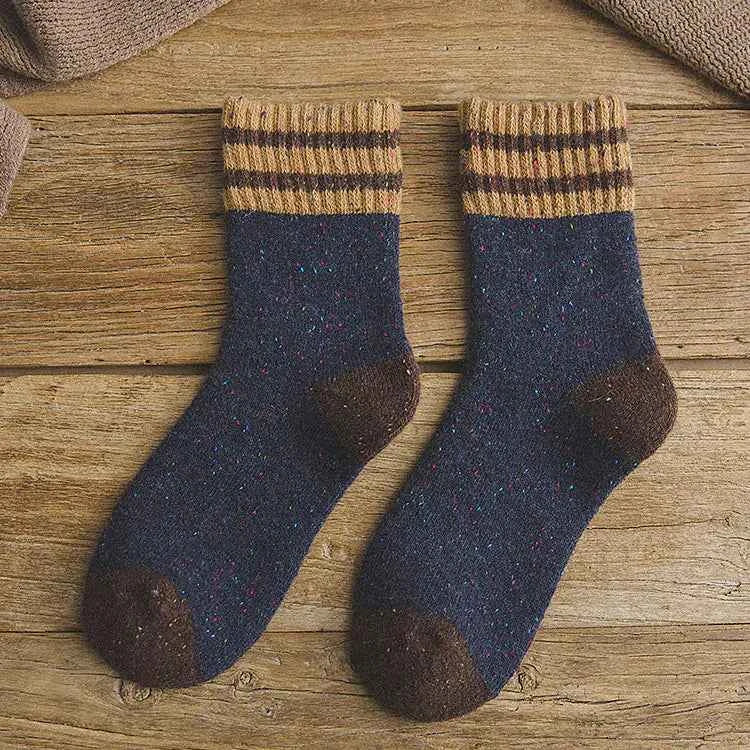 Red thickened warm terry wool socks for women by Mead's Supply & Equipment Outfitters, featuring brushed stripes for cozy winter wear.