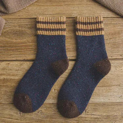 Red thickened warm terry wool socks for women by Mead's Supply & Equipment Outfitters, featuring brushed stripes for cozy winter wear.