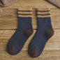 Red thickened warm terry wool socks for women by Mead's Supply & Equipment Outfitters, featuring brushed stripes for cozy winter wear.