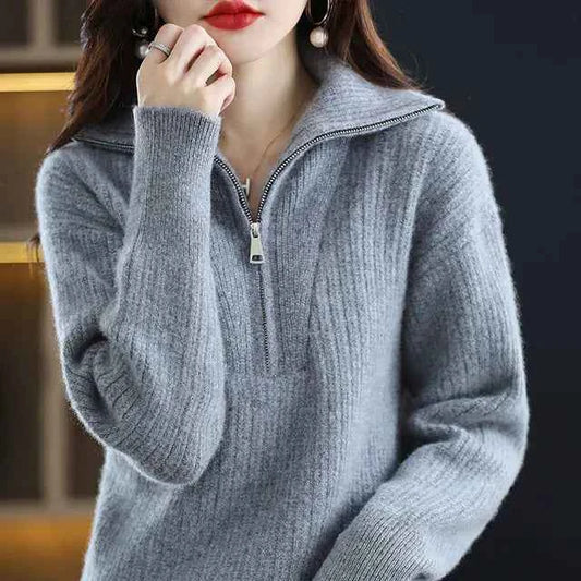 Women's red Merino wool turtleneck sweater with zipper front, loose fit, designed for winter warmth, by Mead's Supply & Equipment Outfitters