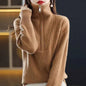 Women's red Merino wool turtleneck sweater with zipper front and loose fit, ideal for winter warmth by Mead's Supply & Equipment Outfitters