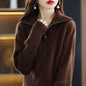 Women’s red Merino wool turtleneck sweater with zipper front and loose fit, ideal for winter warmth, from Mead's Supply & Equipment Outfitters.