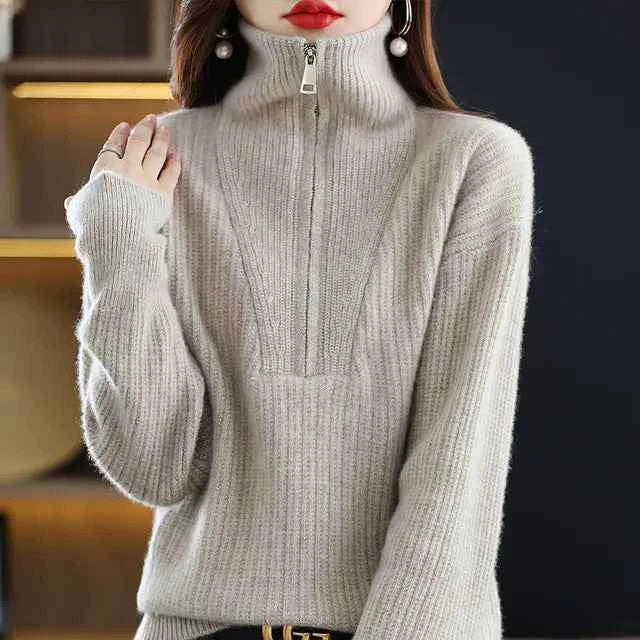 Red women's Merino wool turtleneck sweater with zipper front and loose fit, designed for winter warmth by Mead's Supply & Equipment Outfitters.