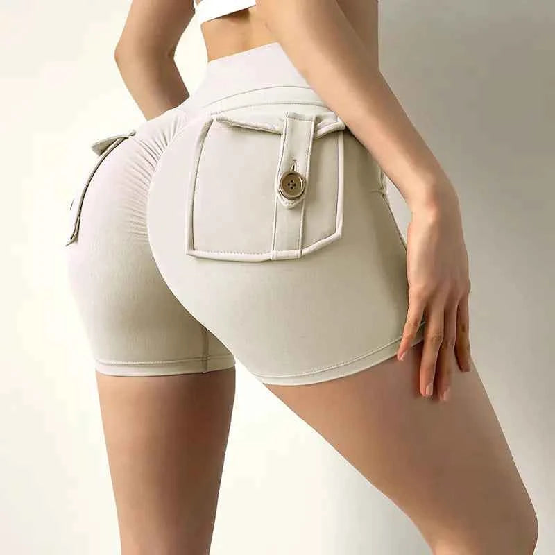White women's high waist stretch yoga shorts by Mead's Supply & Equipment Outfitters, quick-dry athletic shorts for gym and fitness.