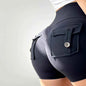 White women's high waist stretch yoga shorts by Mead's Supply & Equipment Outfitters, quick-dry athletic shorts for gym and fitness.