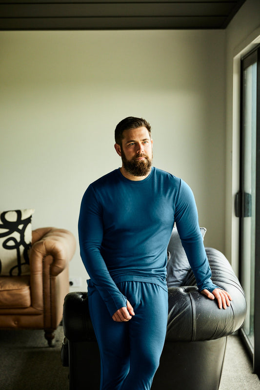 Men's Base Pant by Merino 365 NZ, made of 100% Merino Wool, in Gibraltar color, shown on a model.