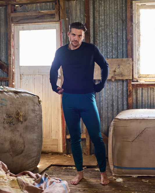 Men's base pant by Merino 365 NZ, made of 100% Merino wool in pine, showing the soft, warm wool fabric and comfortable fit.