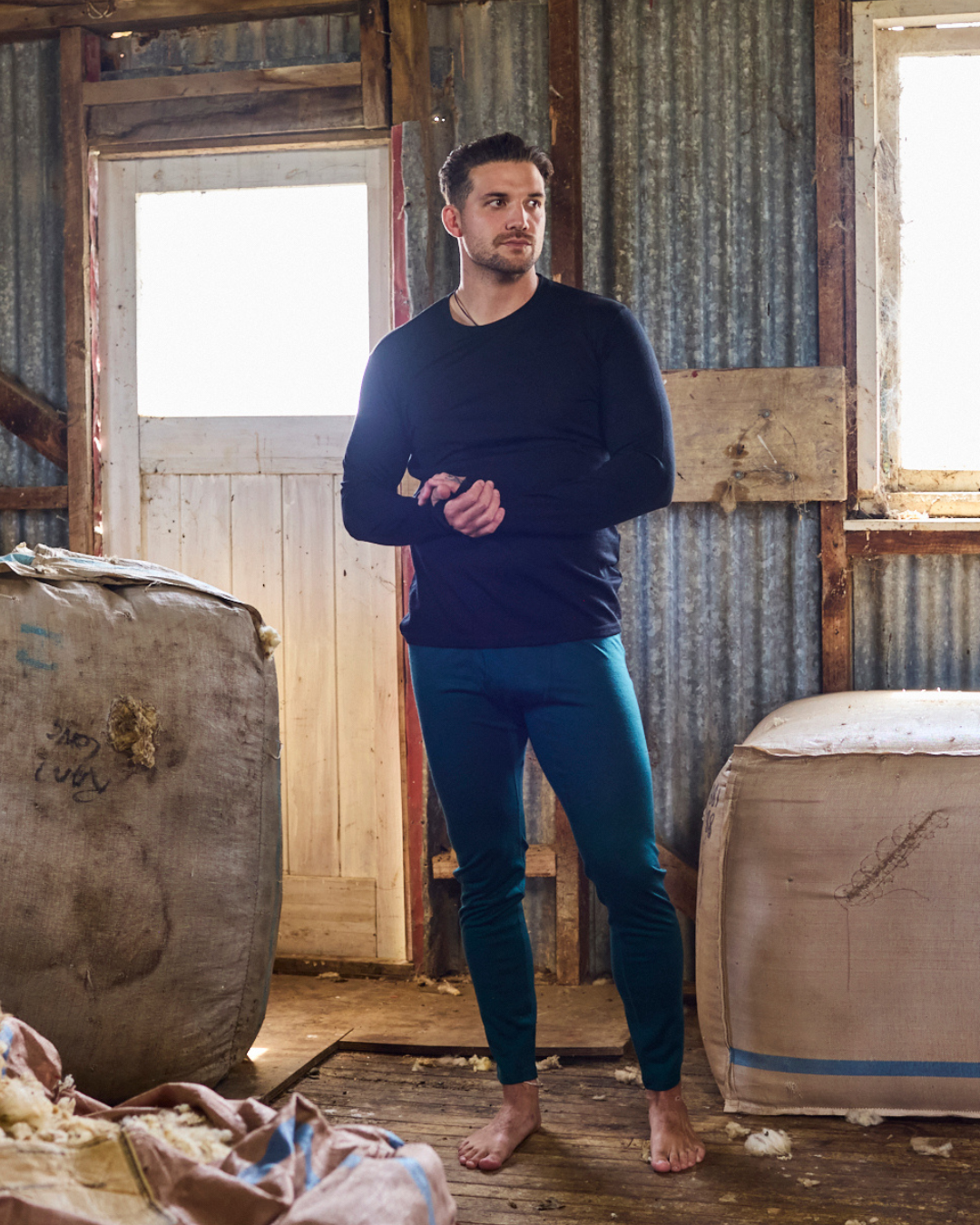 Men's Merino Wool Base Pant in Pine by Merino 365 NZ, showing the 100% Merino Wool men's pants in a natural forest green color.
