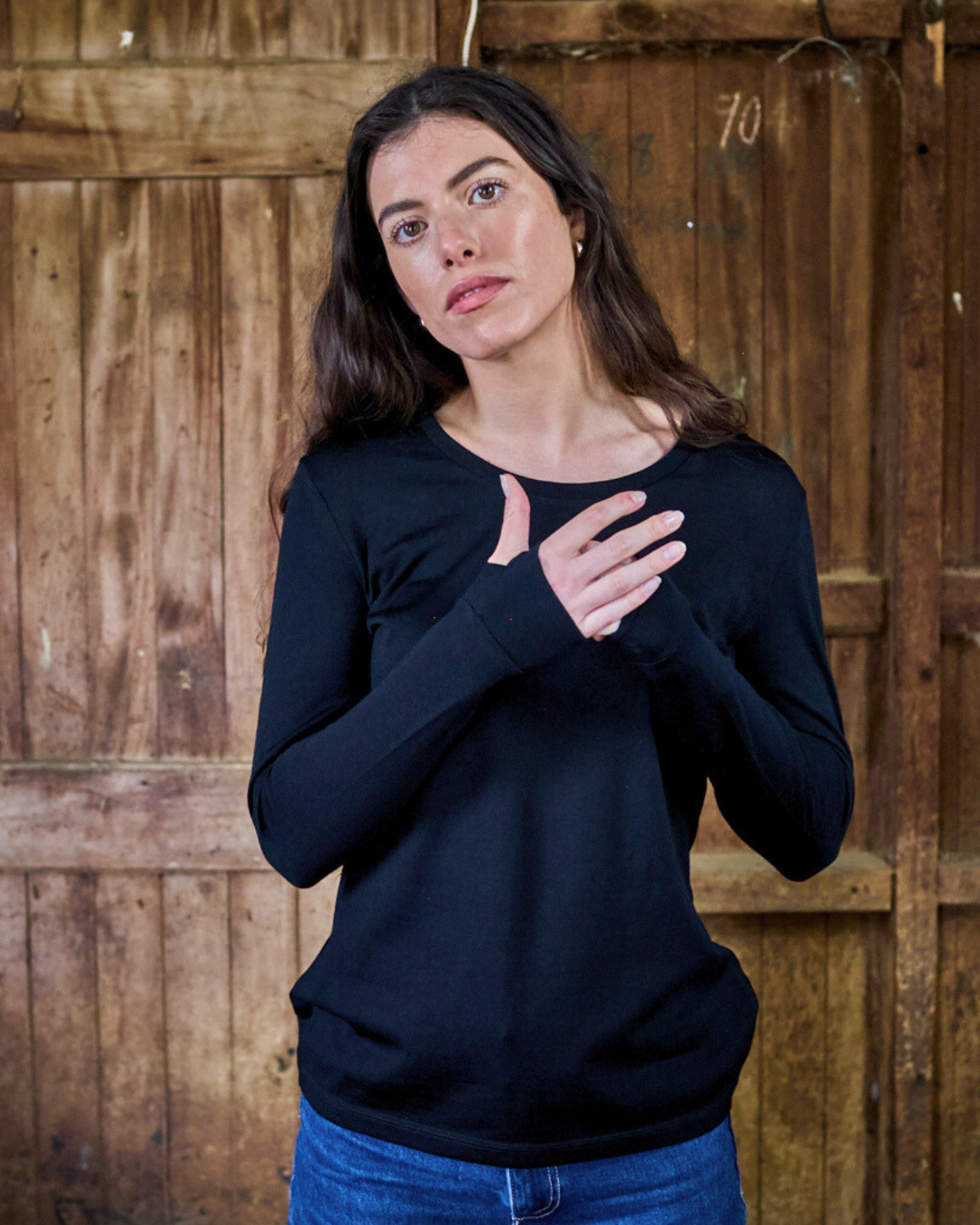 Black women's long sleeve shirt made from 100% Merino wool by Merino 365 NZ, featuring a comfortable standard fit.