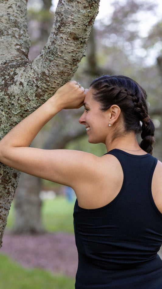 Black women's racerback tank top made from Merino blend, stylish and comfortable women's singlet by Merino 365 NZ.