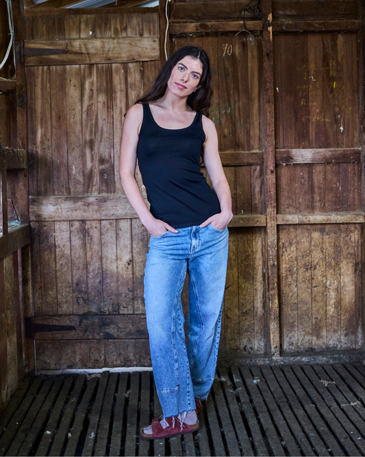 Black women's scoop neck tank top made from 100% Merino wool by Merino 365 NZ, perfect for lightweight, breathable layering.
