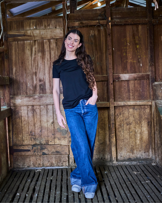 Black women's crew t-shirt made from 100% Merino wool by Merino 365 NZ, comfortable and breathable for everyday wear.