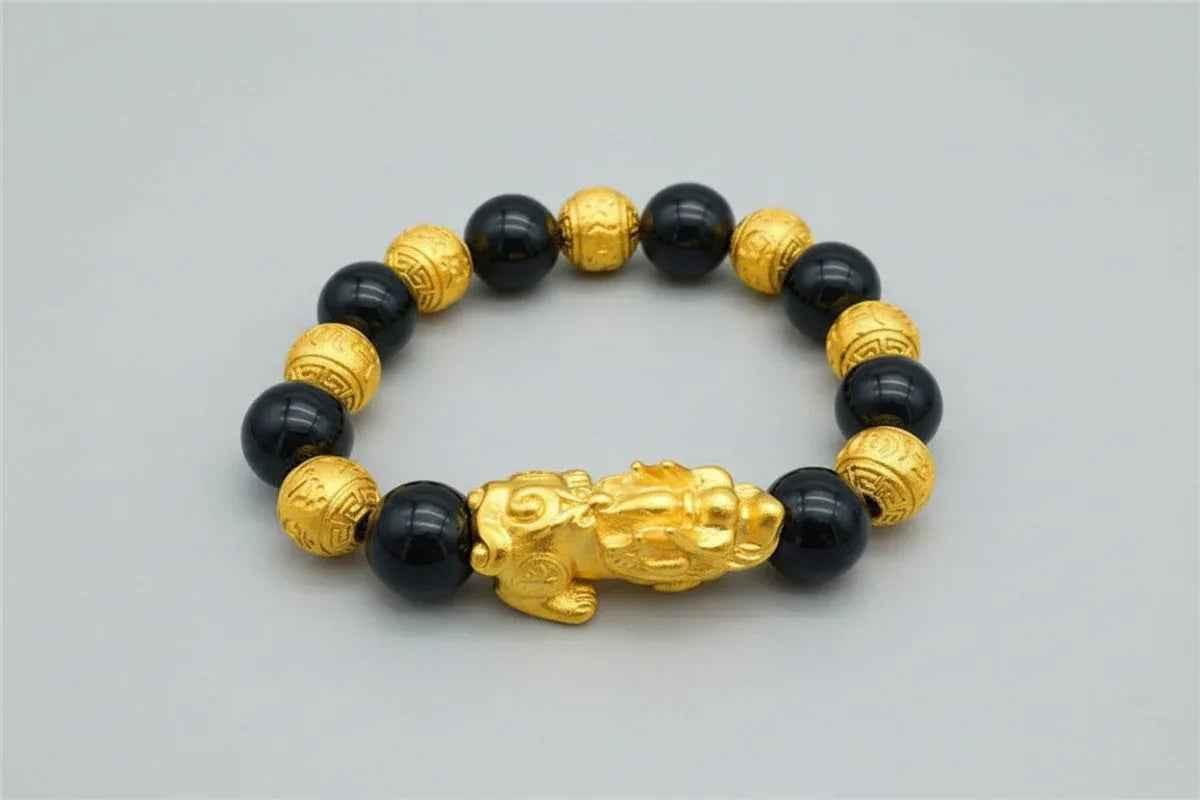 Stylish 3Sixty5 gold bracelet with black beads, featuring a sleek and elegant design for versatile jewelry wear.