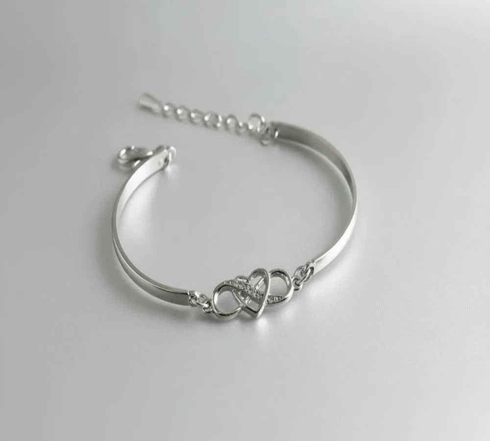 Elegant Forever Love crystal bracelet by Stylish 3Sixty5 featuring silver-tone design and sparkling crystal accents.