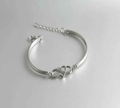 Elegant Forever Love crystal bracelet by Stylish 3Sixty5 featuring silver-tone design and sparkling crystal accents.