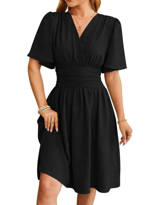 Black Velora Chic elegant V-neck dress by Stylish 3Sixty5, featuring a sophisticated silhouette and stylish design.