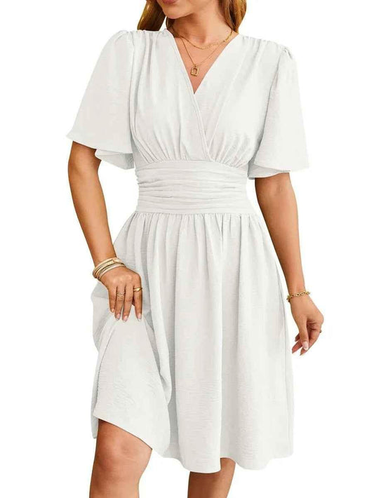 Black Velora Chic Elegant V-Neck Dress by Stylish 3Sixty5, featuring a sophisticated V-neck design and sleek fabric.