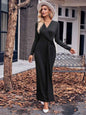 Black women's solid V-neck waist dress by Stylish 3Sixty5, featuring a chic and fitted design for elegant occasions.