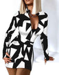 White and black Zipper V-Neck Long Sleeve Bodycon Dress by Stylish 3Sixty5, form-fitting design with a front zipper detail.