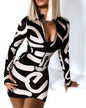 White and black Zipper V-Neck Long Sleeve Bodycon Dress by Stylish 3Sixty5, form-fitting with a stylish zipper detail at the neckline.