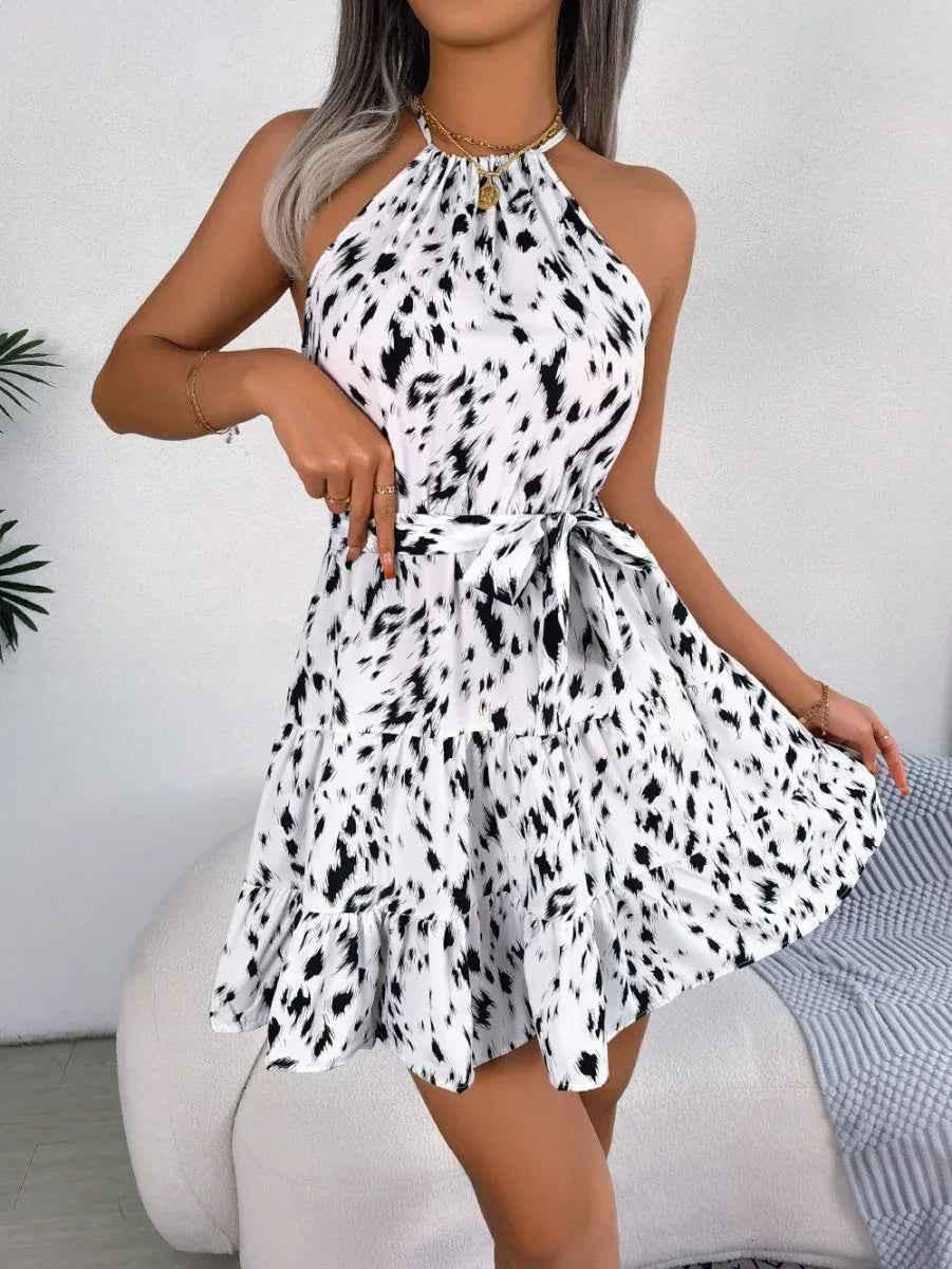 Stylish 3Sixty5 white Savanna Ruffle Dress, casual chic summer dress with lightweight fabric and ruffle details.