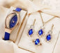 Stylish 3Sixty5 Diva-Shine diamond quartz watch set with matching jewelry in black, featuring elegant design and sparkling accents.