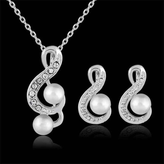 Stylish 3Sixty5 Danbi Pearl jewelry set for women featuring a necklace, earrings, and bracelet with elegant white pearls.