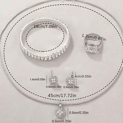 Stylish 3Sixty5 luxury women's jewelry set featuring a gold-tone diamond watch with Roman numerals and matching accessories.