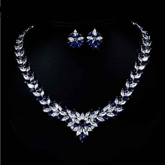 Stylish 3Sixty5 Floral Radiance Zircon Jewelry Set featuring red floral design with sparkling zircon stones.