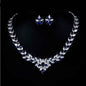 Stylish 3Sixty5 Floral Radiance Zircon Jewelry Set featuring red floral design with sparkling zircon stones.