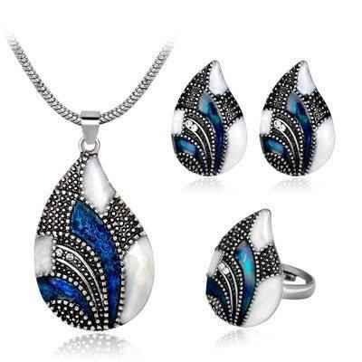 Women's Ocean Mist Drop Jewelry Set by Stylish 3Sixty5, featuring silver earrings and necklace with ocean-inspired design.