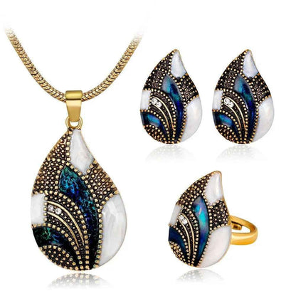 Women's Ocean Mist Drop Jewelry Set by Stylish 3Sixty5 featuring silver earrings and necklace with ocean-inspired design.
