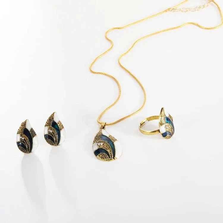 Women's Ocean Mist Drop Jewelry Set by Stylish 3Sixty5 featuring silver earrings and necklace with ocean-inspired design.