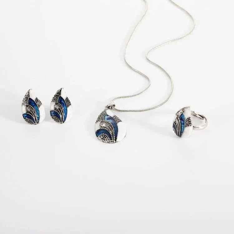 Women's Ocean Mist Drop Jewelry Set by Stylish 3Sixty5 featuring silver earrings and necklace with ocean-inspired design.
