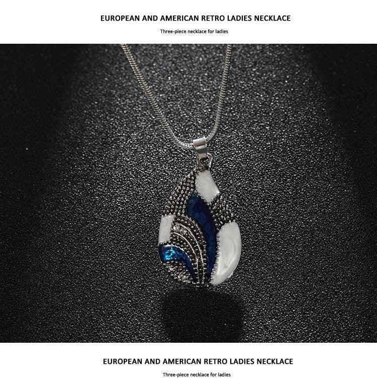 Stylish 3Sixty5 women's Ocean Mist Drop jewelry set featuring silver necklace and earrings with elegant ocean-inspired design.