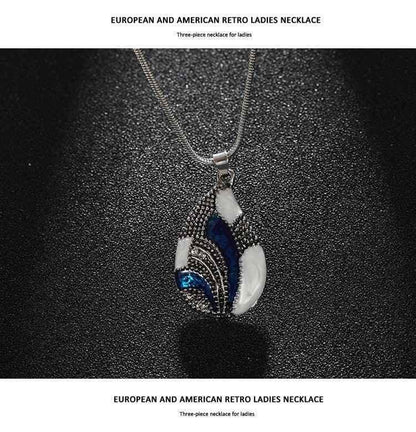 Stylish 3Sixty5 women's Ocean Mist Drop jewelry set featuring silver necklace and earrings with elegant ocean-inspired design.