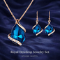 Stylish 3Sixty5 Royal Dewdrop jewelry set with matching necklace and earrings, featuring elegant white gemstones.