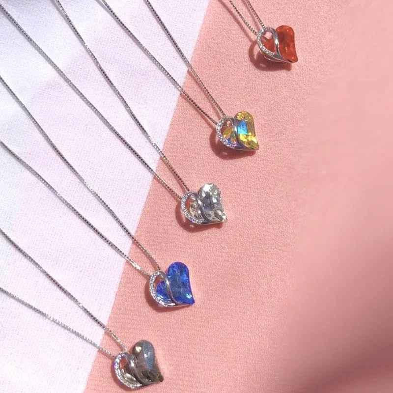 Light blue women's heart-shaped pendant necklace by Stylish 3Sixty5, featuring a delicate jewelry design with a charming heart pendant.