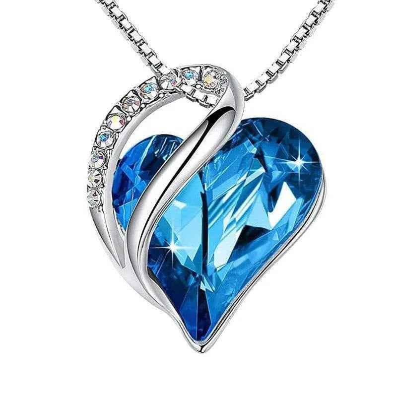 Light blue women's heart-shaped pendant necklace by Stylish 3Sixty5, showcasing elegant jewelry design and delicate chain.