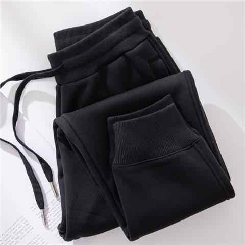 Black unisex Snuggle-Stride Warm Joggers by Stylish 3Sixty5, featuring a comfortable fit and casual pant style.