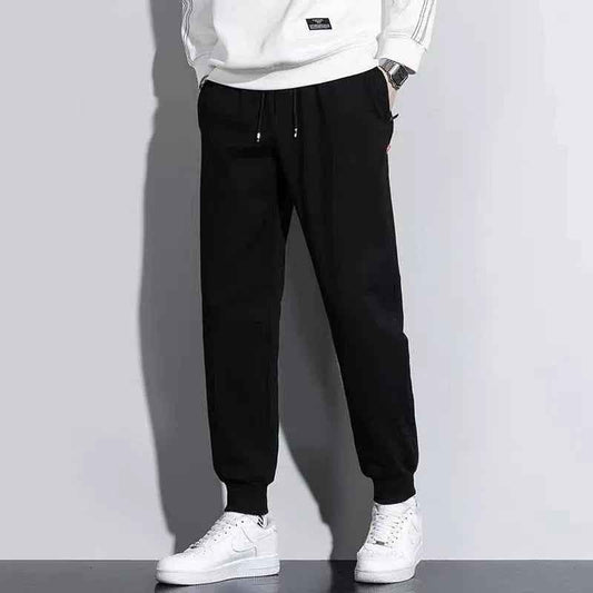Men's Shadow-Stride Athletic Pants by Stylish 3Sixty5, dark color, slim fit design, athletic style, made for active wear.