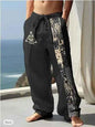 Stylish 3Sixty5 men's black playful print trousers, casual pants with vibrant design, suitable for modern fashion styles.