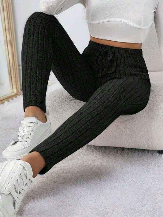 Black women's chic stretch yoga pants by Stylish 3Sixty5, featuring a fitted design and comfortable fabric for active wear.
