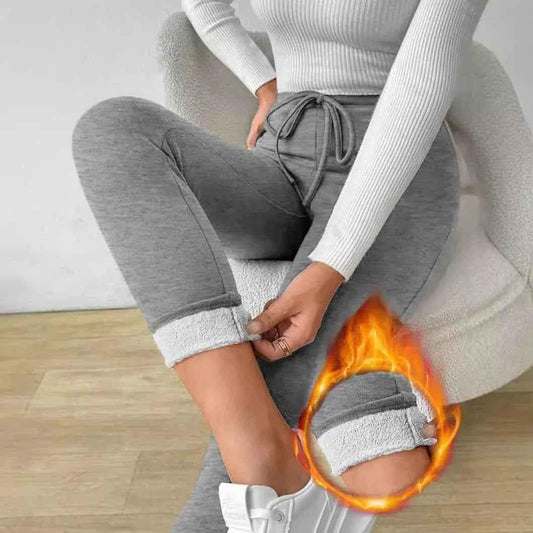 Women’s black chic-stretch yoga pants by Stylish 3Sixty5, fitted and comfortable for active or casual wear.