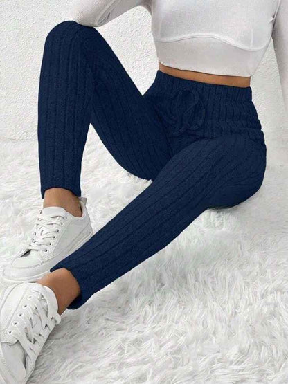 Black women's chic stretch yoga pants by Stylish 3Sixty5, fitted and comfortable for active or casual wear.