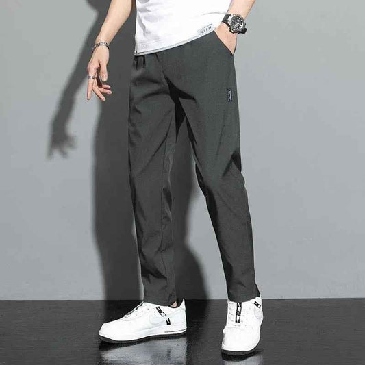Black Stylish 3Sixty5 Ice Silk breathable summer pants, lightweight and comfortable for warm weather, shown on a model.