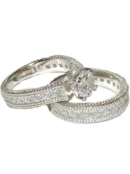 Stylish 3Sixty5 luxury infinite spark diamond ring with intricate band design and sparkling diamonds on a white background.
