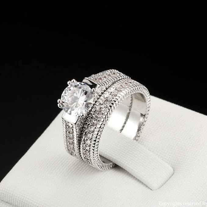 Elegant Luxury Infinite Spark Diamond Ring by Stylish 3Sixty5 featuring a sleek band with sparkling diamonds.
