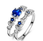 Women's blue gemstone moon ring by Stylish 3Sixty5, featuring a silver band with a prominent blue gemstone moon design.